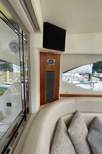 Esquire Yacht Photos Pics Interior of 2017 Riviera 3600 Sport Yacht with plush seating and modern design elements.