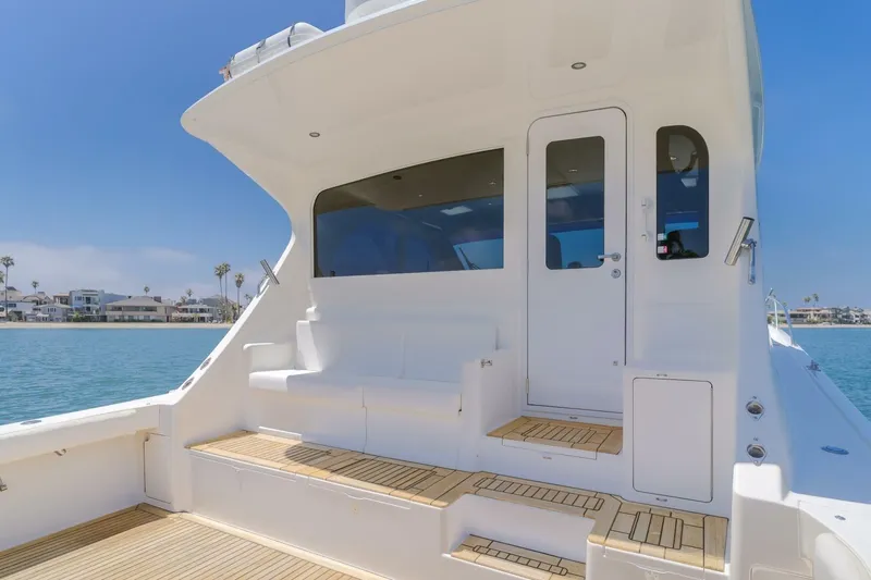 Endurance Yacht Photos Pics 2008 Viking 52 Sport Coupe yacht with sleek white exterior and spacious deck.