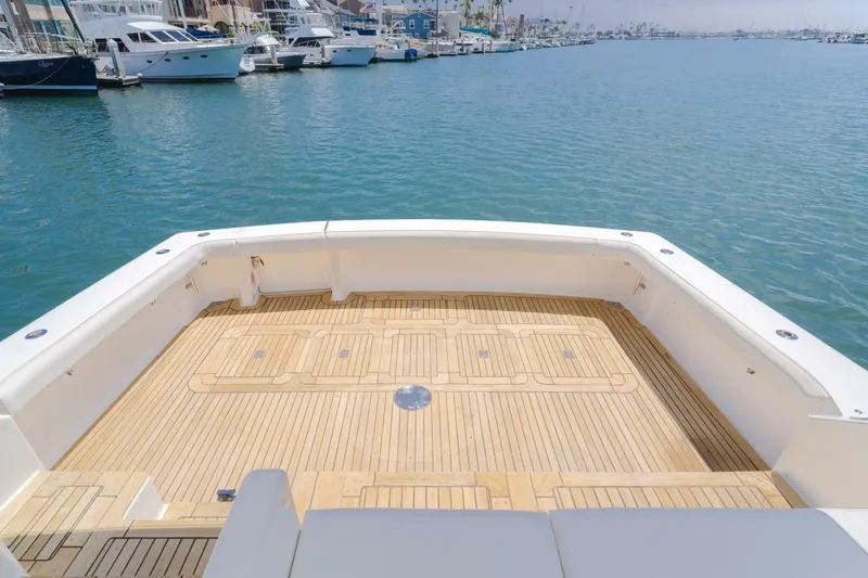 Endurance Yacht Photos Pics Spacious deck of 2008 Viking 52 Sport Coupe yacht in marina setting.