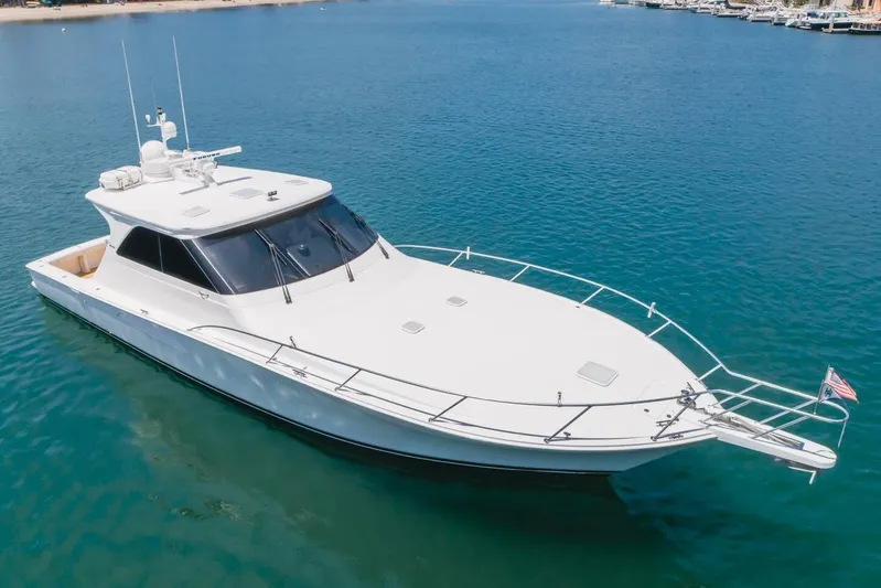 Endurance Yacht Photos Pics 2008 Viking 52 Sport Coupe yacht on calm blue water, aerial view.