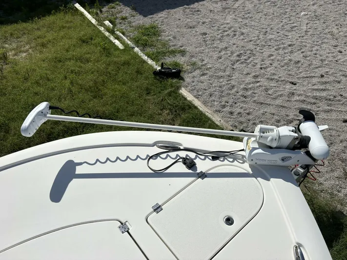  Yacht Photos Pics 2019 Tidewater 2700 Carolina Bay boat with trolling motor on deck.