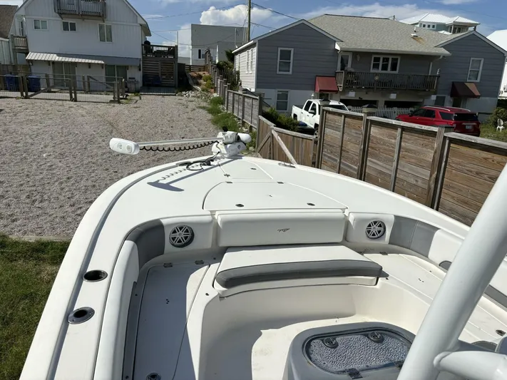 Yacht Photos Pics 2019 Tidewater 2700 Carolina Bay boat docked near coastal homes.