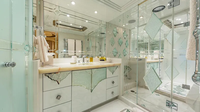 I Love This Boat Yacht Photos Pics Luxurious bathroom on 2002 Christensen Tri Deck yacht with elegant glass and mirrored accents.