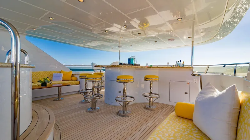 I Love This Boat Yacht Photos Pics Luxurious 2002 Christensen Tri Deck yacht with elegant outdoor bar and seating area.