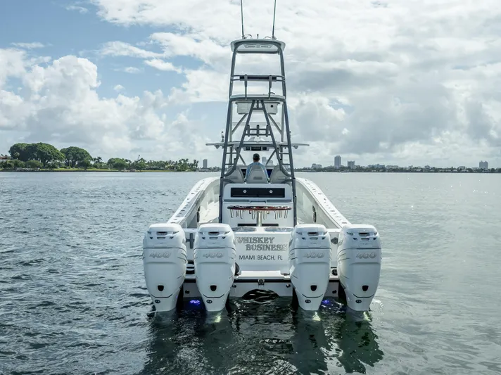 "whiskey Business" Yacht Photos Pics Freeman 42 LR 2020 boat with four engines on open water.