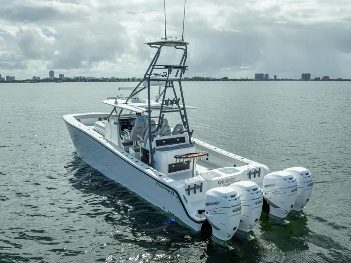 "whiskey Business" Yacht Photos Pics 2020 Freeman 42 LR boat with triple Mercury engines on calm water.