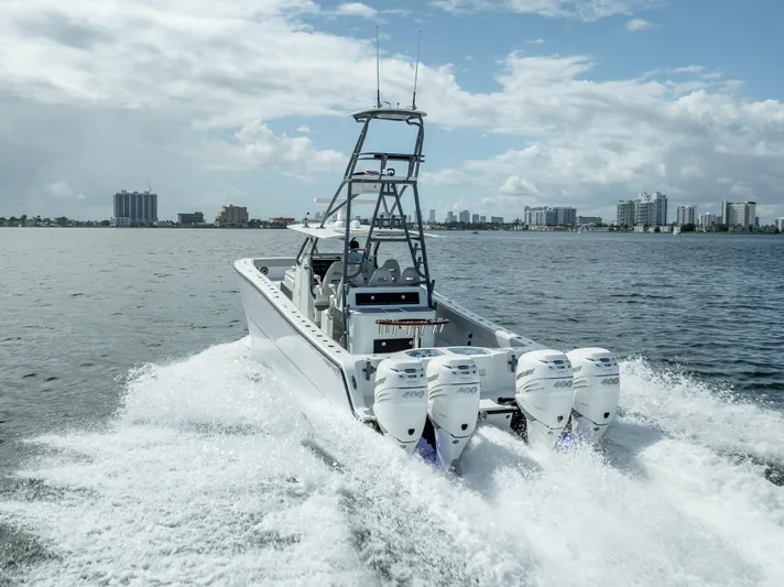 "whiskey Business" Yacht Photos Pics Freeman 42 LR 2020 boat cruising on water with four powerful engines.