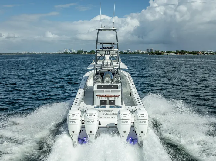 "whiskey Business" Yacht Photos Pics Freeman 42 LR boat cruising on ocean, rear view, 2020 model.