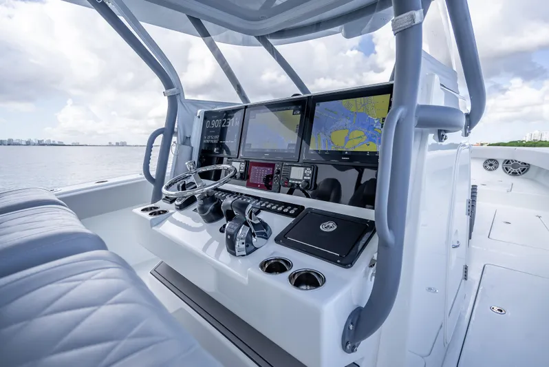 "whiskey Business" Yacht Photos Pics Freeman 42 LR 2020 boat dashboard with advanced navigation systems on open water.