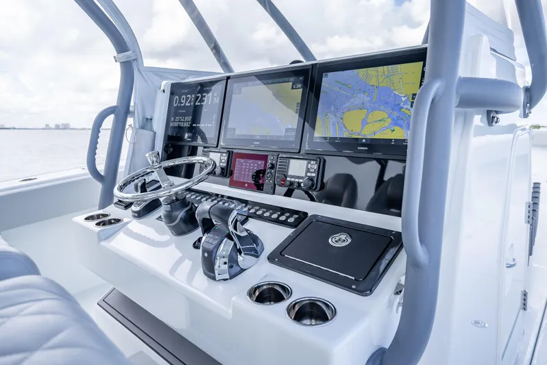 "whiskey Business" Yacht Photos Pics Freeman 42 LR 2020 boat dashboard with navigation screens and controls.