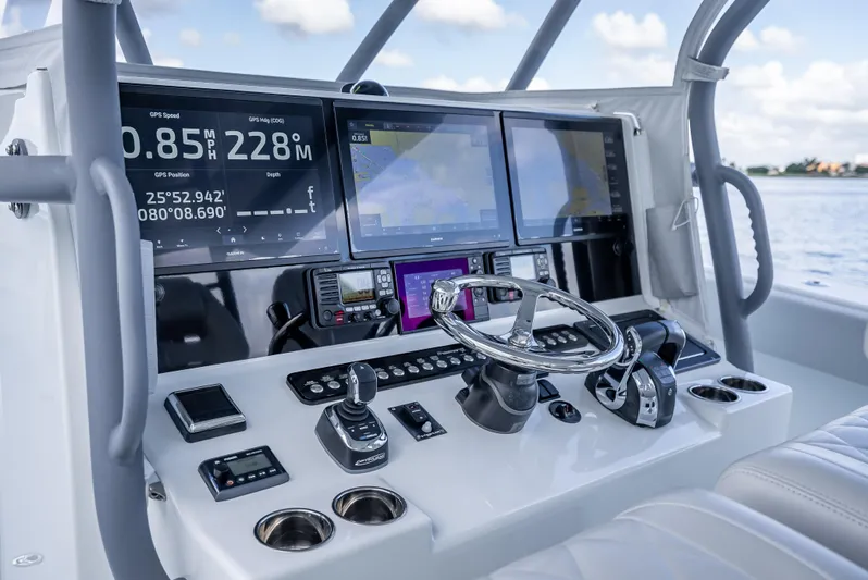 "whiskey Business" Yacht Photos Pics Freeman 42 LR 2020 boat dashboard with advanced navigation displays and controls.
