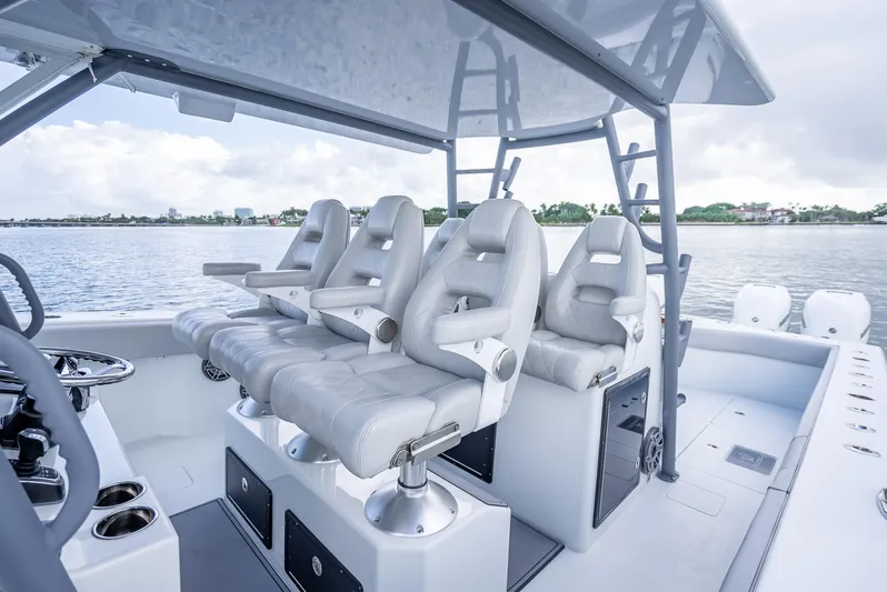 "whiskey Business" Yacht Photos Pics Luxury seating on 2020 Freeman 42 LR boat, featuring modern design and waterfront view.