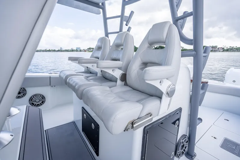 "whiskey Business" Yacht Photos Pics Luxury seating on 2020 Freeman 42 LR boat, featuring sleek design and waterfront view.