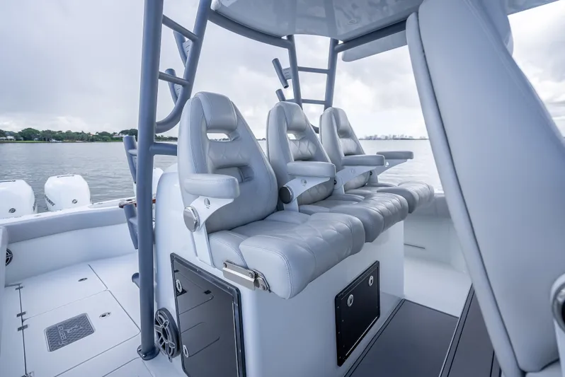 "whiskey Business" Yacht Photos Pics 2020 Freeman 42 LR boat interior with luxurious seating and sleek design.