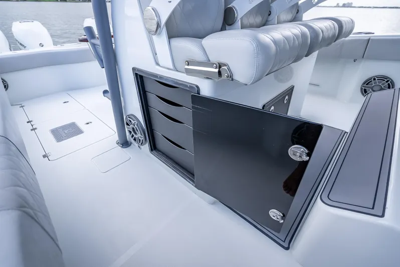 "whiskey Business" Yacht Photos Pics 2020 Freeman 42 LR boat interior with storage compartments and seating.