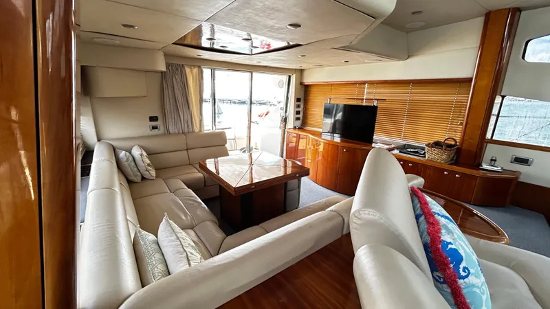 2006 Sunseeker Manhattan 60 @ Cancun Yacht Photos Pics Luxurious interior of 2006 Sunseeker Manhattan 60 yacht with elegant seating and modern amenities.