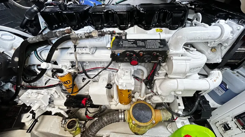 2006 Sunseeker Manhattan 60 @ Cancun Yacht Photos Pics Engine of a 2006 Sunseeker Manhattan 60 yacht, showcasing detailed components and wiring.