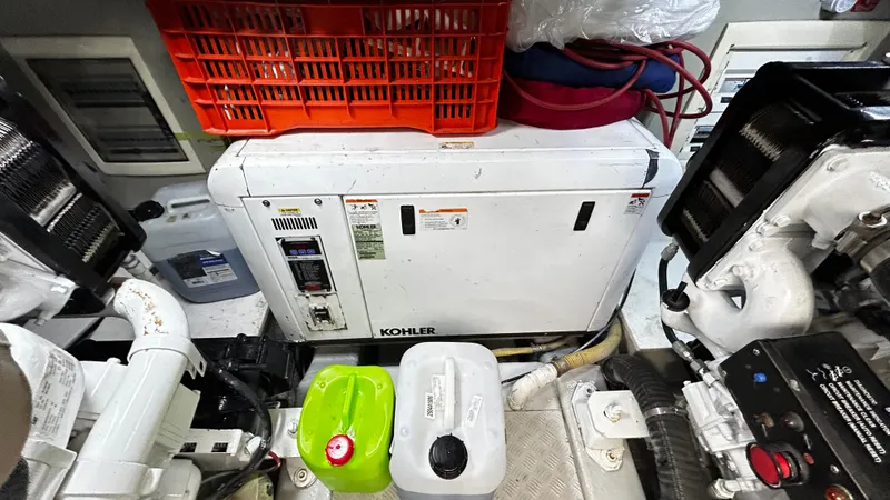 2006 Sunseeker Manhattan 60 @ Cancun Yacht Photos Pics Engine room of 2006 Sunseeker Manhattan 60 yacht with Kohler generator.