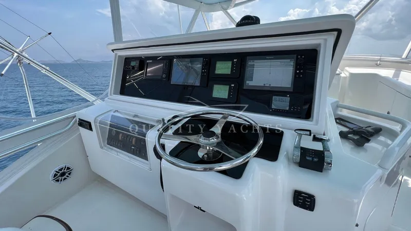 Saietta Yacht Photos Pics 2010 Bertram Convertible yacht helm with advanced navigation systems and ocean view.