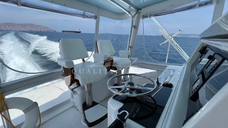 Saietta Yacht Photos Pics 2010 Bertram Convertible yacht interior with ocean view.