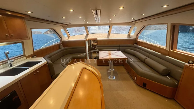 Saietta Yacht Photos Pics Luxurious interior of a 2010 Bertram Convertible yacht with panoramic ocean views.