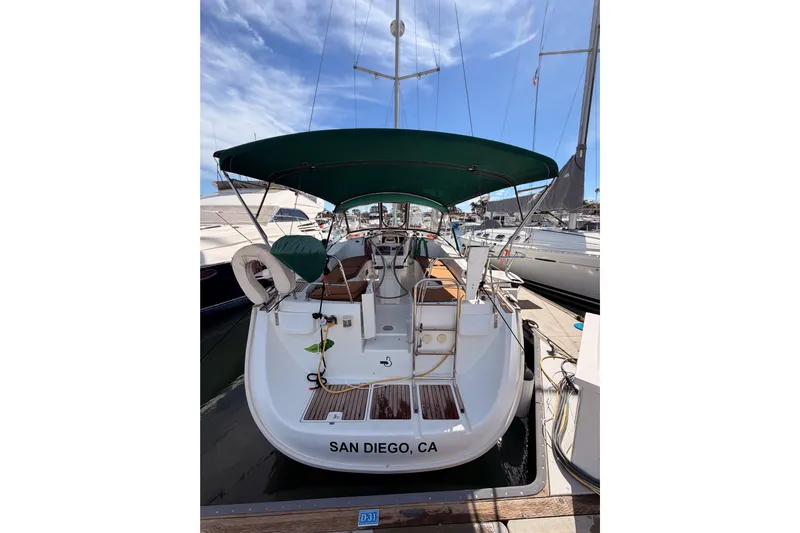 Tadpole Yacht Photos Pics 2005 Beneteau Oceanis Clipper 423 docked in San Diego marina.