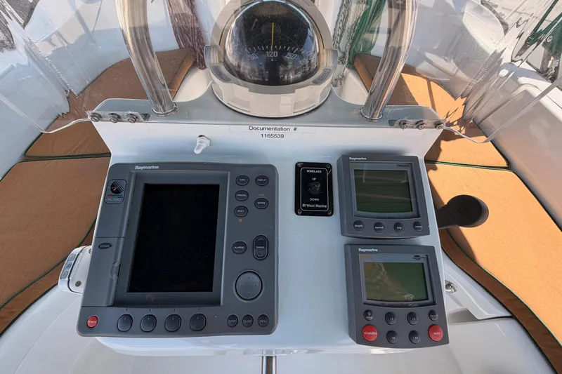 Tadpole Yacht Photos Pics Control panel of a 2005 Beneteau Oceanis Clipper 423 sailboat with navigation instruments.