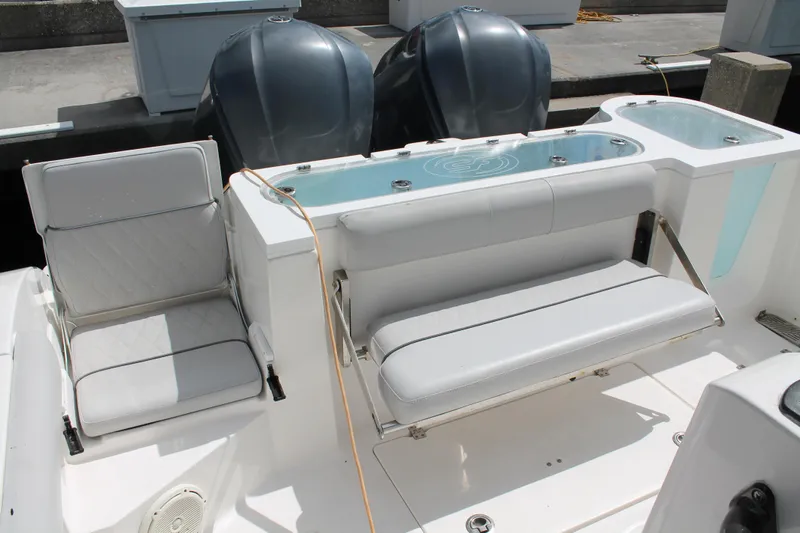  Yacht Photos Pics 2018 Sea Fox 328 Commander boat interior with seating and dual outboard engines.