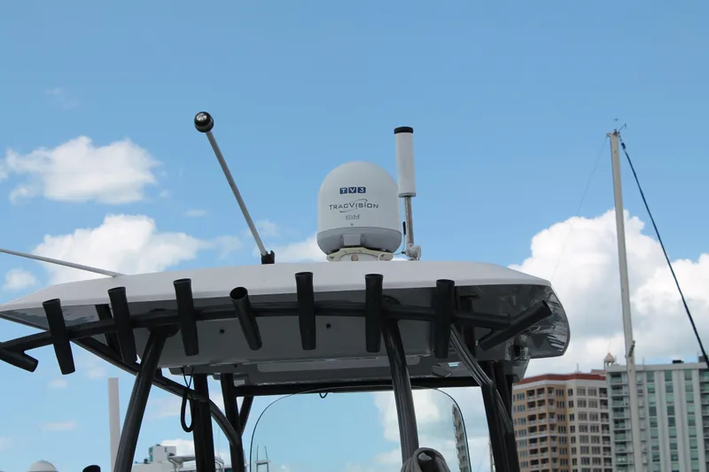 Yacht Photos Pics 2018 Sea Fox 328 Commander boat with radar equipment against a blue sky.