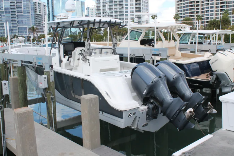  Yacht Photos Pics 2018 Sea Fox 328 Commander boat docked with twin outboard engines.