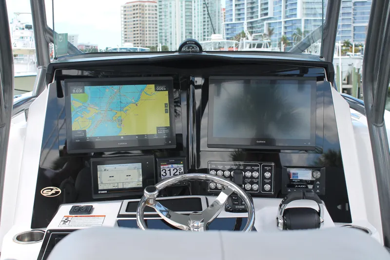  Yacht Photos Pics 2018 Sea Fox 328 Commander dashboard with navigation screens and controls.