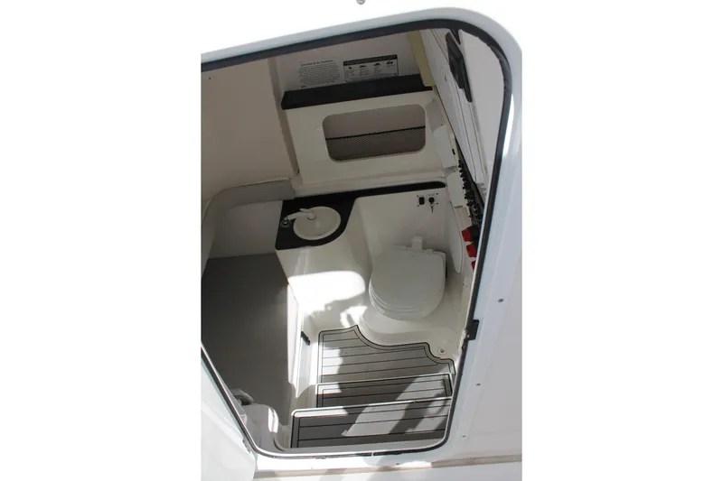  Yacht Photos Pics 2018 Sea Fox 328 Commander boat interior bathroom with toilet and sink.