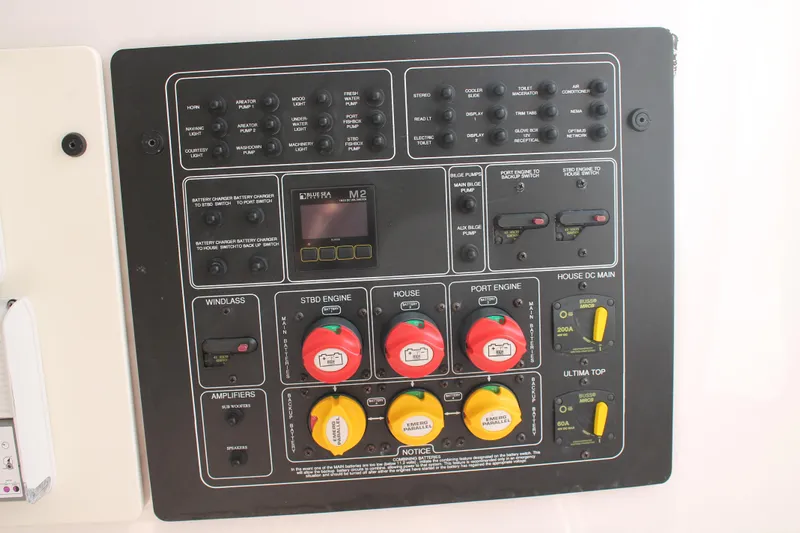  Yacht Photos Pics Control panel of a 2018 Sea Fox 328 Commander boat with various switches and indicators.