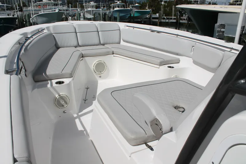  Yacht Photos Pics 2018 Sea Fox 328 Commander boat interior with cushioned seating and speakers.