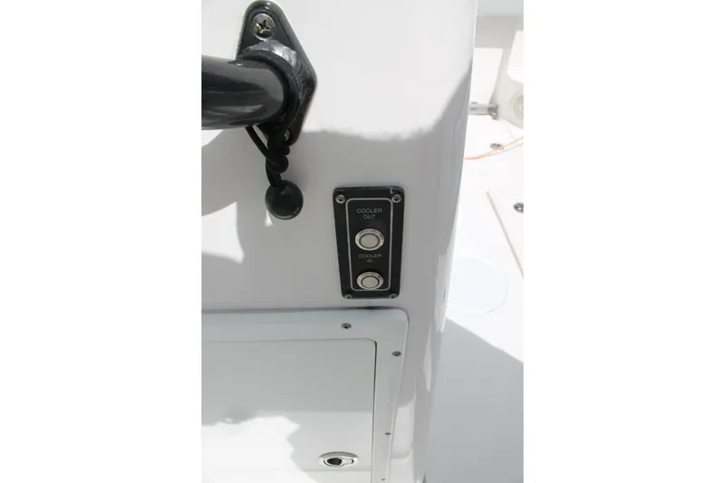  Yacht Photos Pics Control panel on 2018 Sea Fox 328 Commander boat, featuring cooler in/out buttons.