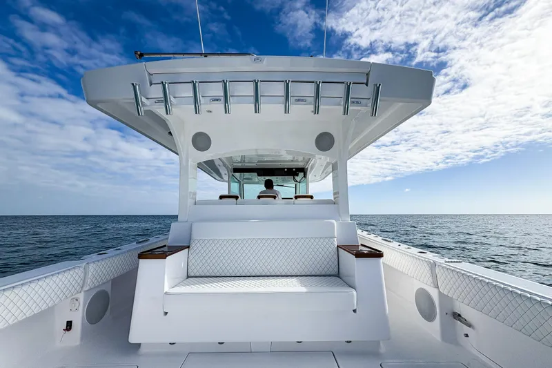  Yacht Photos Pics 2026 HCB 48 Campeon boat on open sea under blue sky.