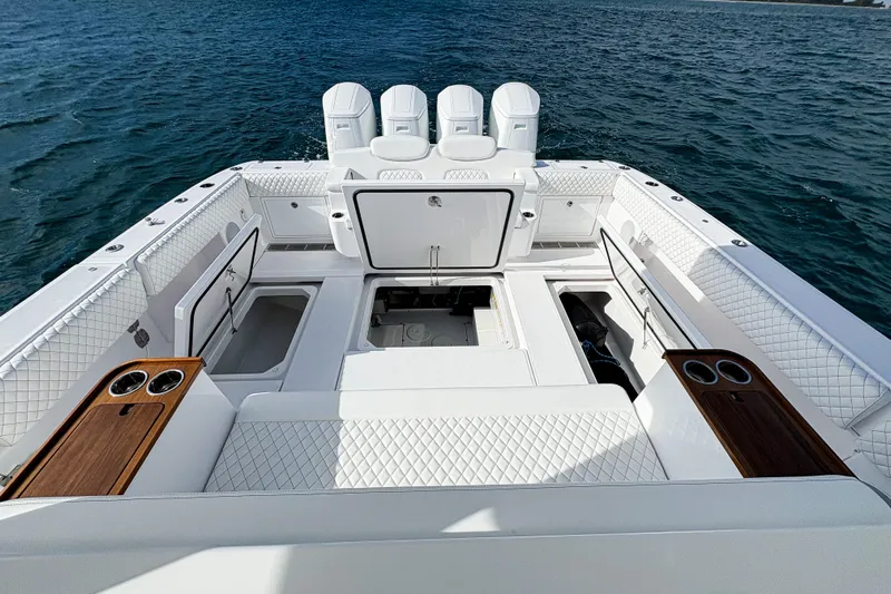  Yacht Photos Pics 2026 HCB 48 Campeon boat interior with luxurious seating and ocean backdrop.