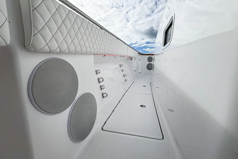  Yacht Photos Pics Interior view of 2026 HCB 48 Campeon boat, featuring sleek design and modern speakers.