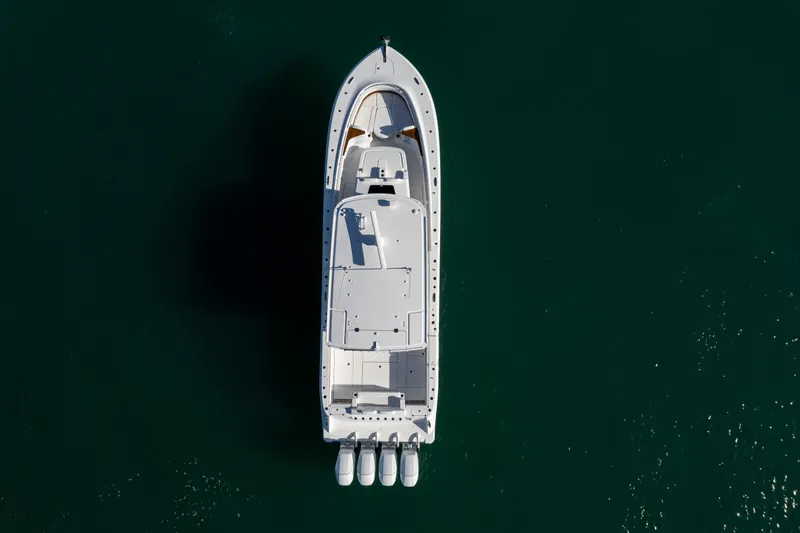 Yacht Photos Pics Aerial view of 2026 HCB 48 Campeon boat on calm water.