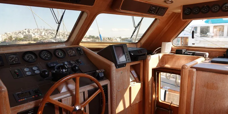 Althea Yacht Photos Pics Interior of 1993 Aegean Yacht Schooner with wooden helm and navigation instruments.