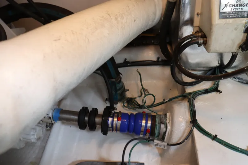  Yacht Photos Pics Engine room of 2004 Ocean Yachts 43 Super Sport, showcasing mechanical components and wiring.