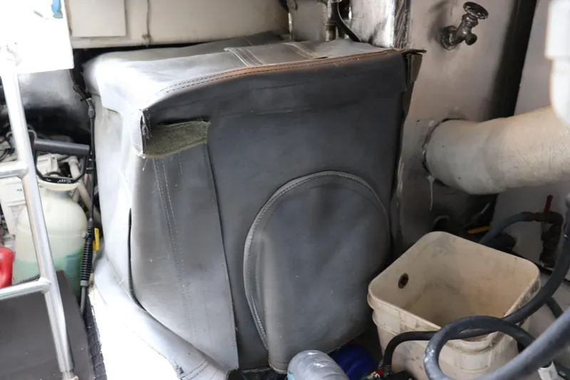  Yacht Photos Pics Engine room of 2004 Ocean Yachts 43 Super Sport with equipment and storage items.