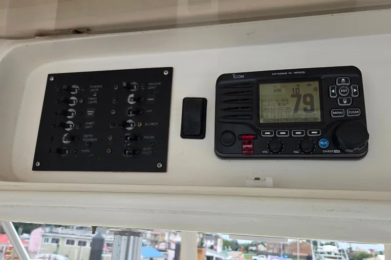  Yacht Photos Pics Control panel and VHF radio on a 2004 Ocean Yachts 43 Super Sport.