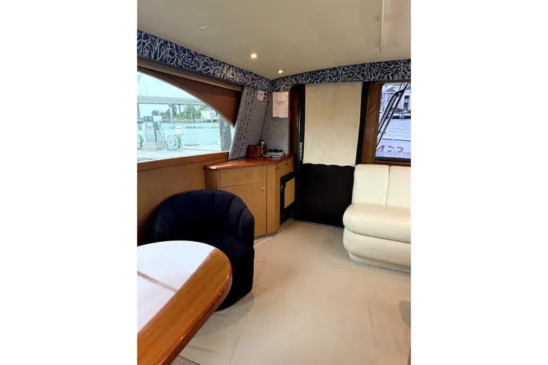  Yacht Photos Pics Interior of 2004 Ocean Yachts 43 Super Sport with elegant seating and wood accents.