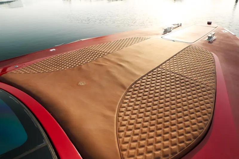 Mercedes Yacht Photos Pics Luxurious leather deck of 2016 Silver Arrow 460 GT yacht by the water.