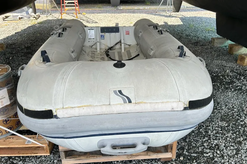  Yacht Photos Pics Inflatable dinghy under a 2019 Fountaine Pajot Helia 44 Evolution catamaran.