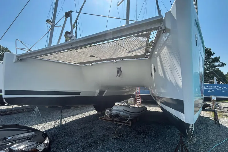  Yacht Photos Pics 2019 Fountaine Pajot Helia 44 Evolution catamaran on dry dock, side view.