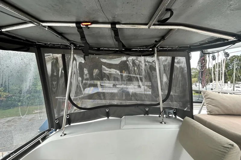  Yacht Photos Pics 2019 Fountaine Pajot Helia 44 Evolution cockpit with protective canopy and comfortable seating.