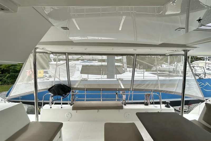  Yacht Photos Pics 2019 Fountaine Pajot Helia 44 Evolution catamaran interior with marina view.