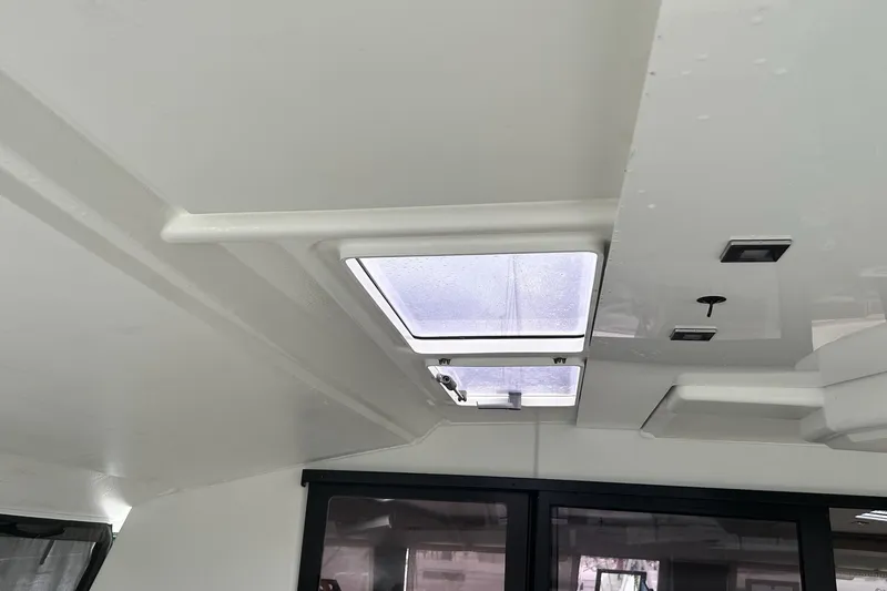  Yacht Photos Pics Interior view of 2019 Fountaine Pajot Helia 44 Evolution yacht ceiling with skylight.